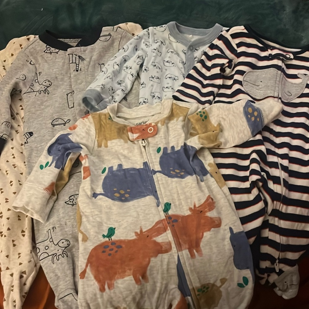 Lightly used baby onesies..0-3 mo.